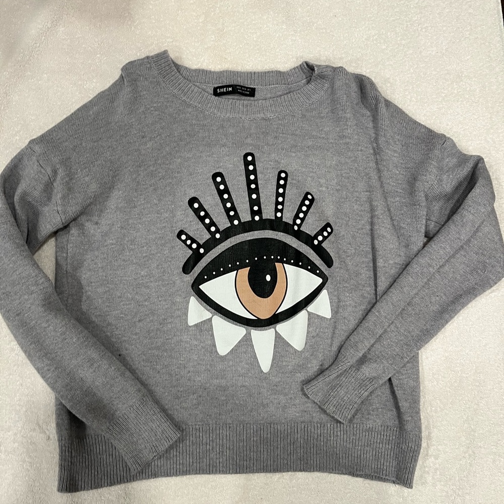 Eye sweater. so cute for everything and trendy. I’m obsessed. never worn yet!!